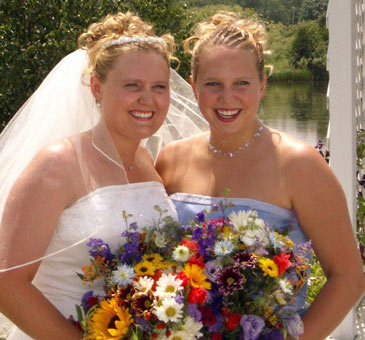 Bride with Bridesmaid holding bouquets